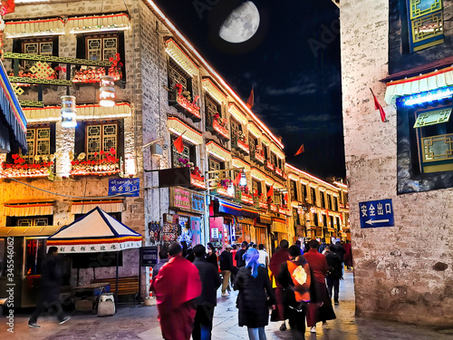 Shopping along the Barkhor Square in Lhasa at night photo