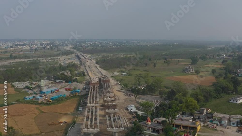 Dehradun, Uttarakhand/India- May 2 2020: World disaster . Coronavirus 3 Lockdown in India. Aerial views of empty roads , shops closed in india uttarakahnd dehradun   .  Aerials 4k photo