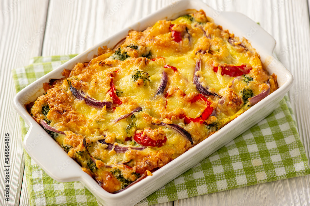 Colorful vegetable casserole with cheese, vegetarian dish.