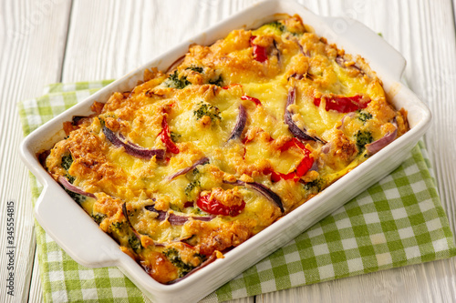 Colorful vegetable casserole with cheese, vegetarian dish.