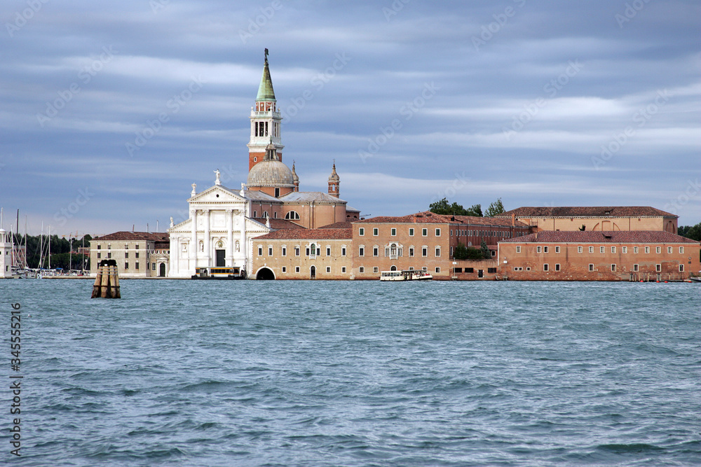 View of the cathedral in Venice with the sea in the foreground