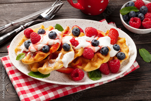 Delicious belgian waffles with summer berries