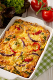 Colorful vegetable casserole with cheese, vegetarian dish.