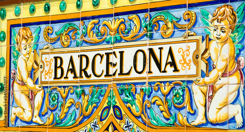 Spanish colorful tile with text Barcelona, Plaza de Espana in Seville