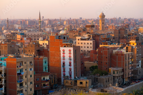 Cairo skyline at sunset stacked houses buildings Egypt 
