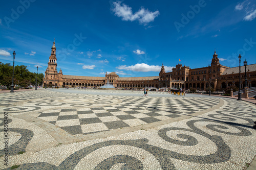 September 10, 2019, Sevilla, Andalusia, Spain, tourists on Square of Spain in hot sunny day photo