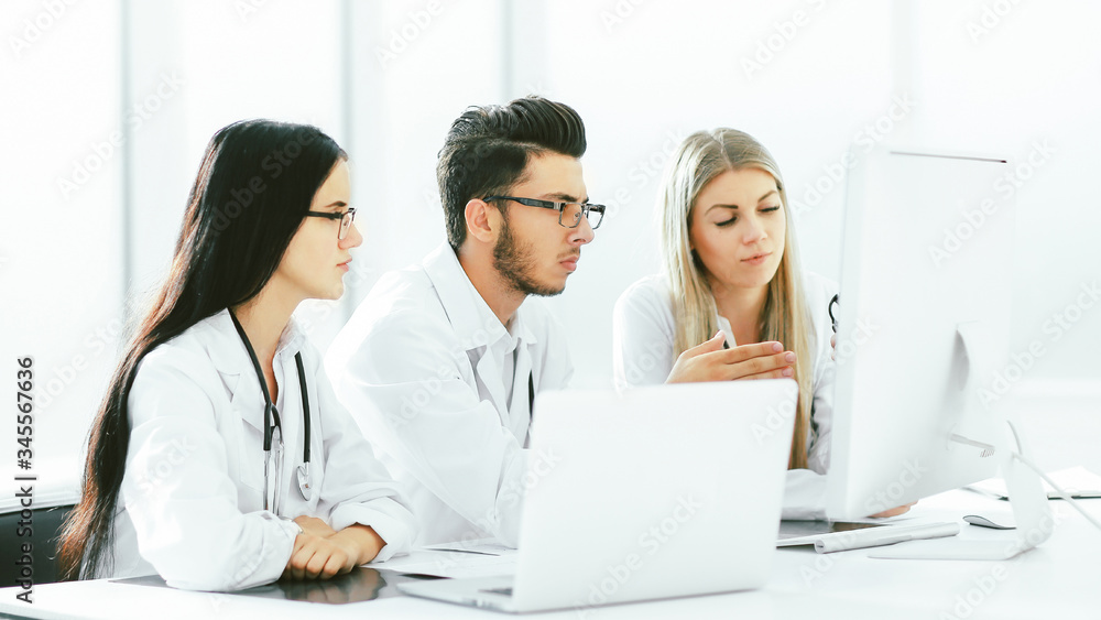 group of medical experts discussing online information. group of medical experts discussing online information.