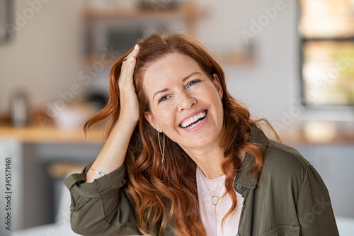 Mature beautiful woman laughing photo