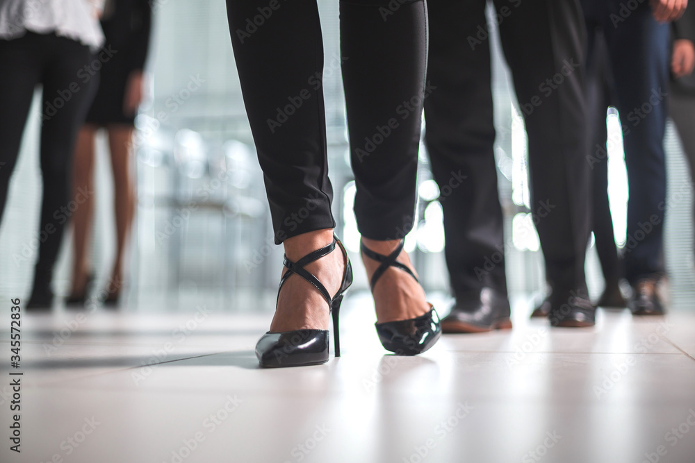 image of a group of corporate employees walking in the office image of a group of corporate employees walking in the office