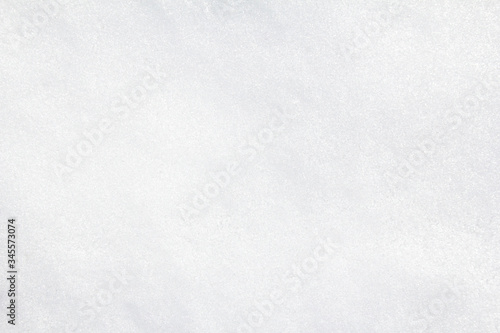 Top view of white icy snow surface texture background. Copy space for text.