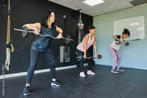 Functional fitness workout at the gym of young people during training