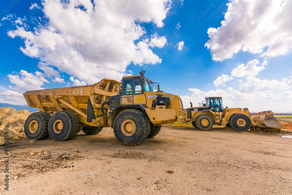 Excavator and truck in a quarry