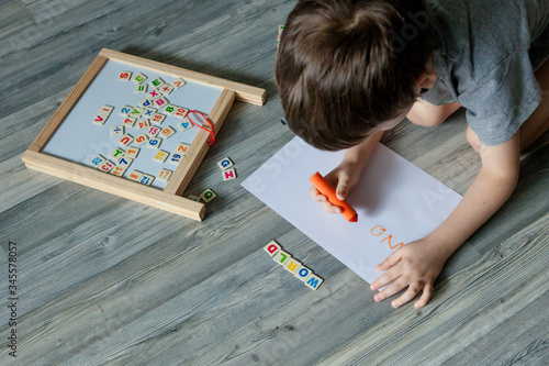 little boy writing