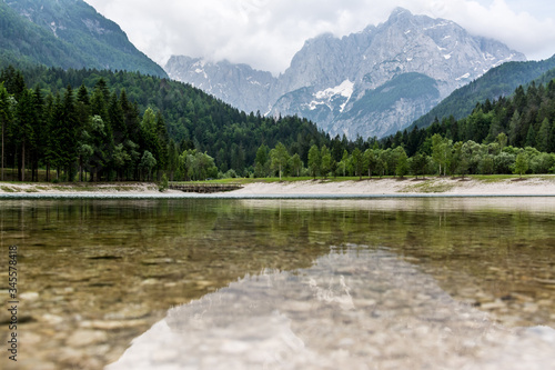 Lake Jasna in Slovenia with mountains in the background