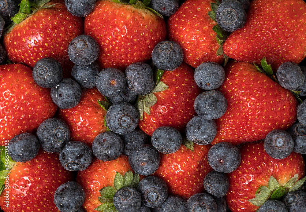 Obraz premium Fresh summer berries, blueberries and strawberries.