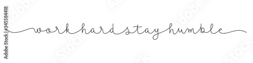 WORK HARD STAY HUMBLE black vector monoline calligraphy banner with swashes
