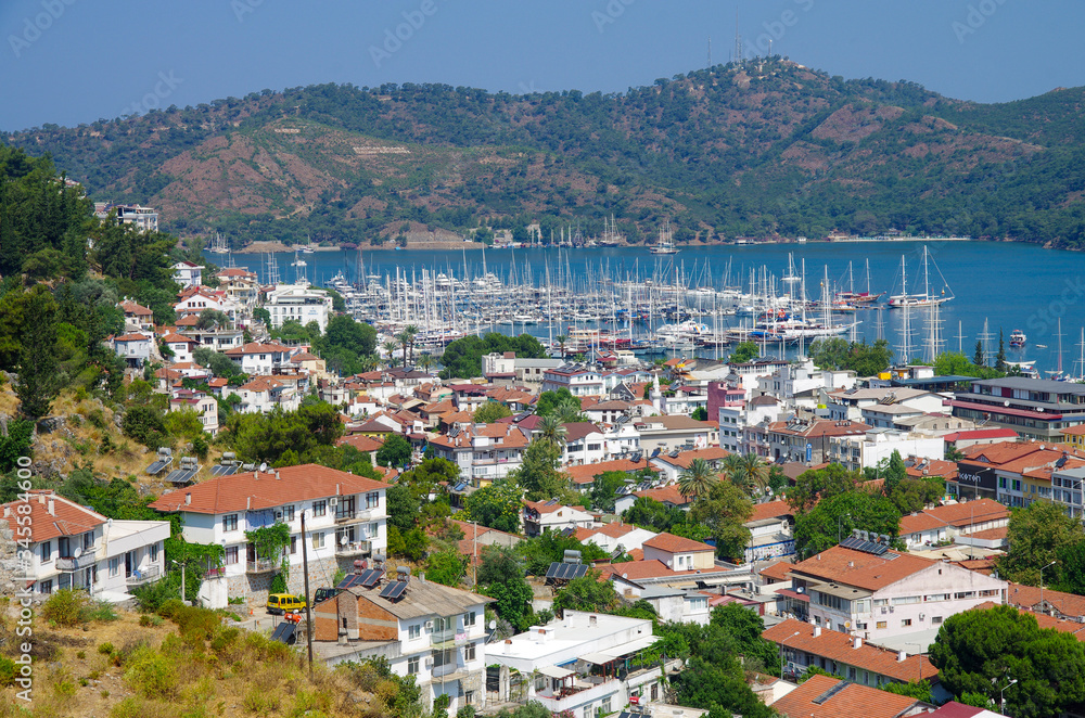 Fototapeta premium FETHIYE, TURKEY - June, 2019: View of the city from mountain