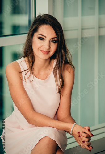 Free Download beautiful and stylish girl resting in an apartment - GFXLoad