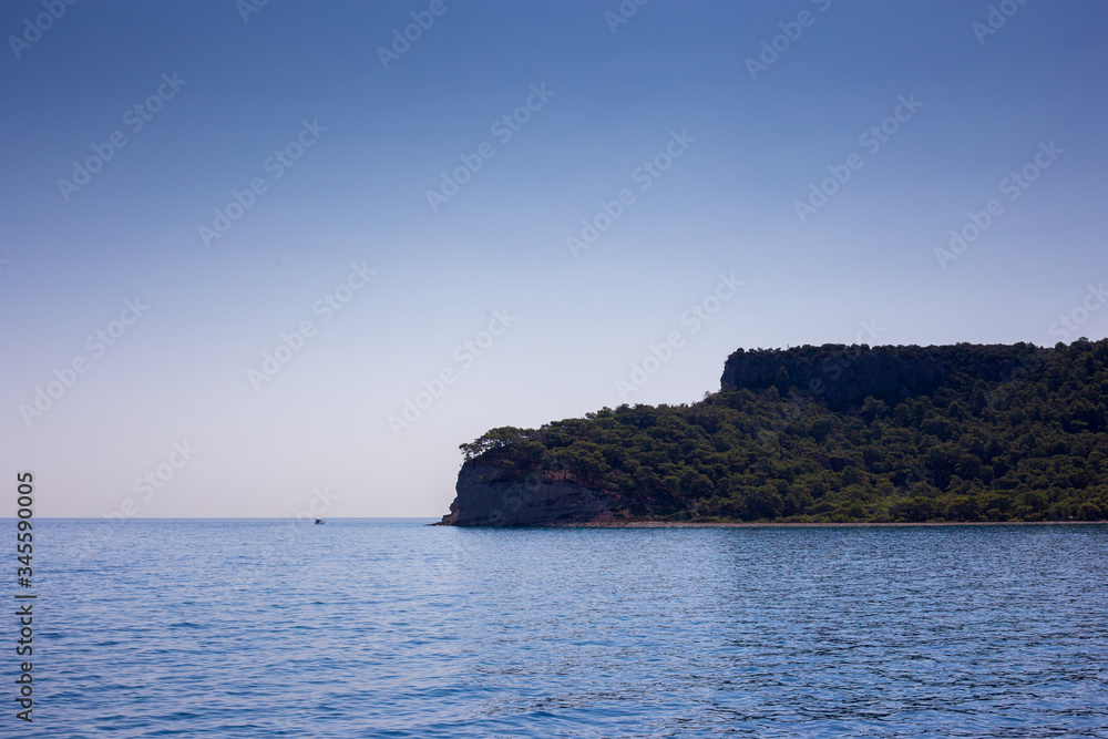 Kemer, Turkey / 08-28-2019. View of the mountains of Kemer. Kemer, Turkey / 08-28-2019. View of the mountains of Kemer.