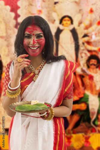 Potrait Of A Bengali Married Woman Holding puja Thali 