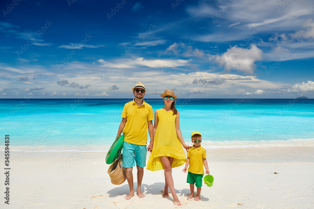 Family with three year old boy on beach. Seychelles, Mahe. Family with three year old boy on beach. Seychelles, Mahe.