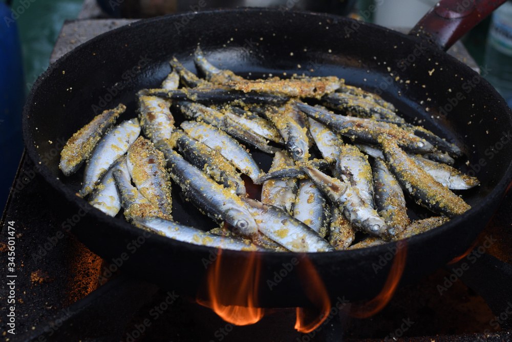 Freshly grilled fish on counter top stall, during seafood festival, street food market. Freshly grilled fish on counter top stall, during seafood festival, street food market.