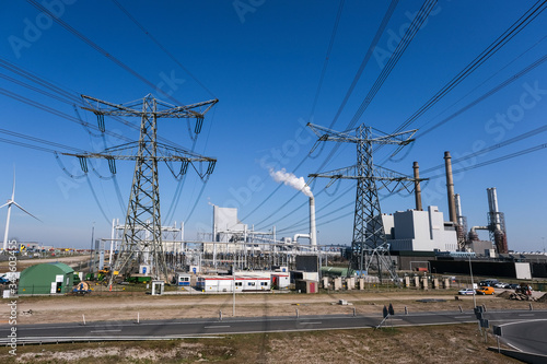 High-voltage power lines. Electricity distribution station. high voltage electric transmission tower. Distribution electric substation with power lines and transformers.