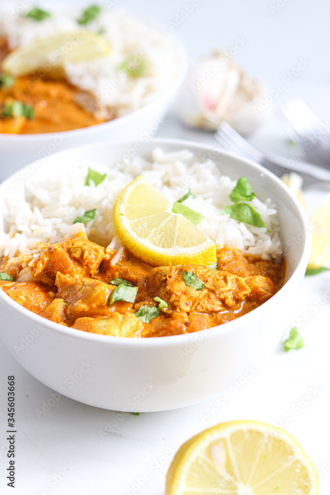 Chicken Tikka with Basmati Rice, Coriander and Lemon. Indian cuisine inspired dish, perfect as a healthy lunch or dinner. Chicken Tikka with Basmati Rice, Coriander and Lemon. Indian cuisine inspired dish, perfect as a healthy lunch or dinner.