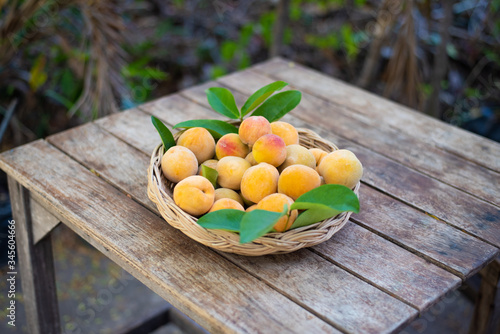 Fototapeta Naklejka Na Ścianę i Meble -   Peach fruit on wood table.