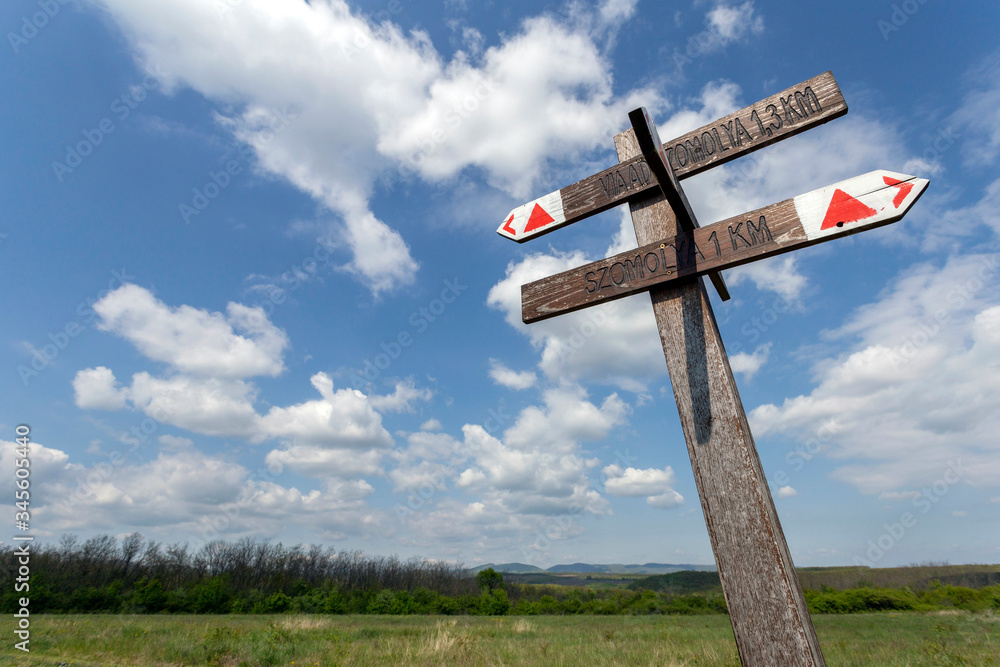 Wood signpost in the Bukk mountains near Szomolya, Hungary Wood signpost in the Bukk mountains near Szomolya, Hungary