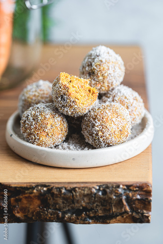 Healthy Organic Gluten and Sugar Free Dessert of Carrot Balls, Coconut flacks and nut Creme