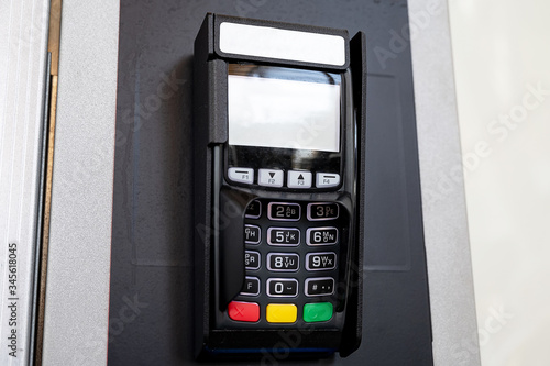 Black modern pos bank terminal for paying for transportation. purchase of goods in the machine