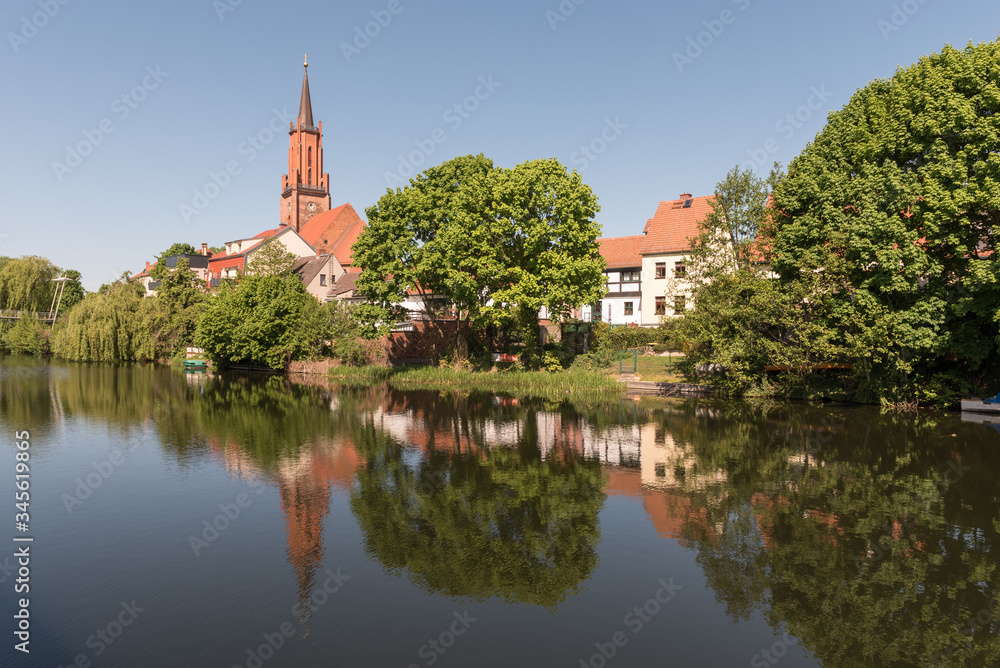 St. Marien-Andreas church at the city canal at the old harbour in Rathenow St. Marien-Andreas church at the city canal at the old harbour in Rathenow