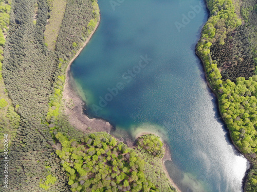 Fototapeta Naklejka Na Ścianę i Meble -  Aerial view of crystal clear Peetschsee located in Stechlin conservation area, Brandenburg Germany