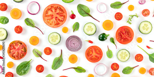 Fresh summer vegetable panorama  a flat lay on a white background  vibrant food pattern  shot from above