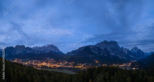 Schilderij op canvas Autumn night Cortina d'Ampezzo Dolomites mountain town, Belluno, Italy