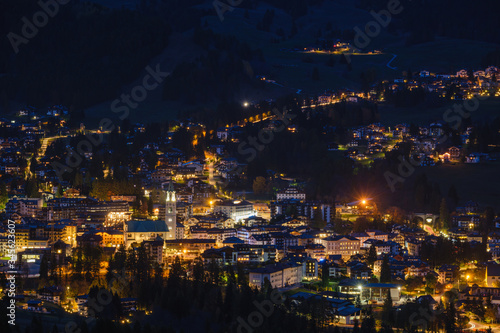 Autumn night Cortina d'Ampezzo Dolomites mountain town, Belluno, Italy.