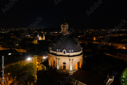 Aerial view on Dominican Church in Lviv, Ukraine from drone at night