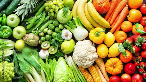 Panoramic food background with assortment of fresh organic vegetables