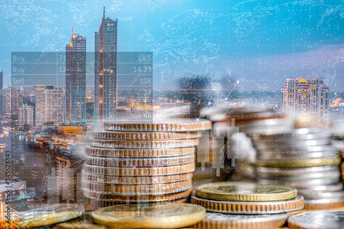 Business Concept, Finance investment saving up money for great financial purpose growing in market and business capital, gross profit with coin stacked pile graphic stock graph and charts copyspace