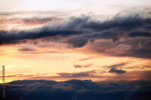 Beautiful landscape of orange evening sunset in the sky with clouds. The concept of the natural environment © Рустам Мухомедьяров