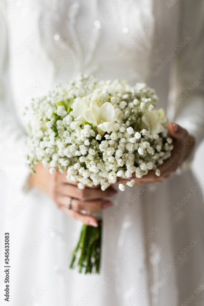 Wedding bouquet of bride that she holds in her hands Wedding bouquet of bride that she holds in her hands