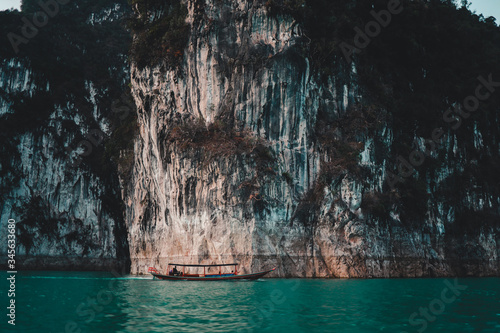 The boat surrounded by rivers and mountains