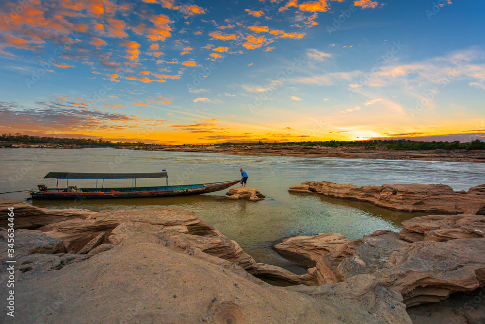 Sunrise landscape photo with boat, mountain,Sam Phan Bok, Ubon Ratchathani, Thailand 
