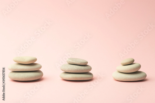  Zen background pink color with Japanese stones  stone towers  for spa  meditation and relaxation.