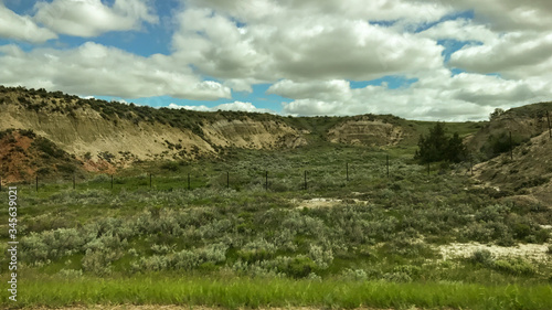 Grass and rock formation over North Dakota Badlands. USA 