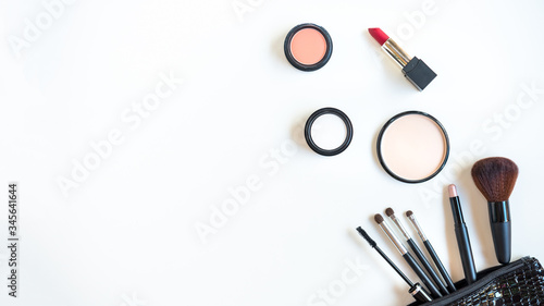 Makeup beauty cosmetic fashion set background. Cosmetics woman bag product facial, lipstick and items decorative composition flat lay on white background.  Lifestyle fashion Concept