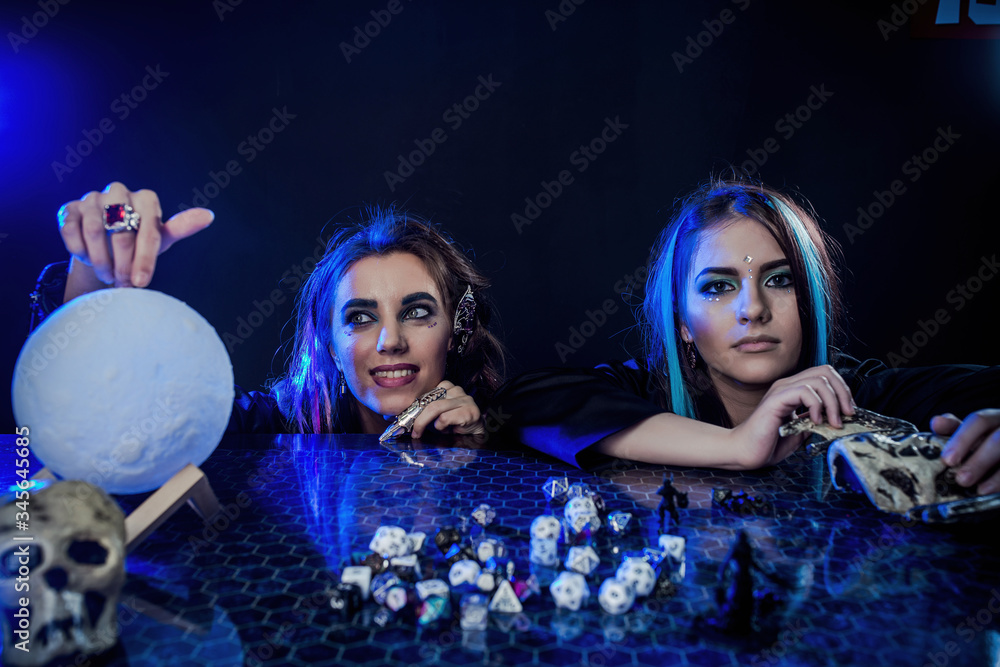 two girls are getting ready to play dnd two girls are getting ready to play dnd