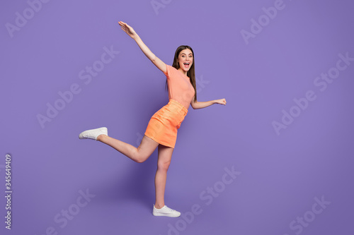 Obraz na plátně Full length profile photo of funny lady shopper leading rolling imaginary store