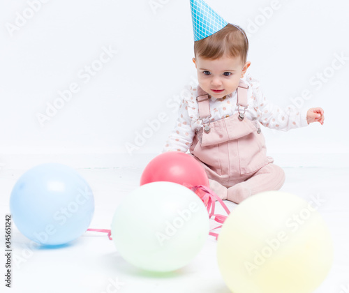 Baby birthday party with ballons